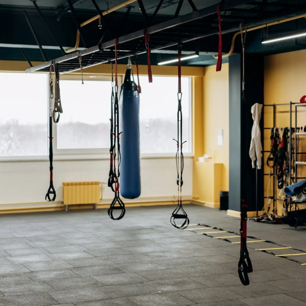 an open gym with a punching bag