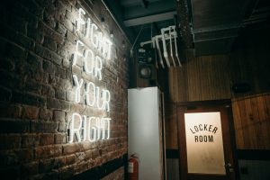A fitness center mission statement in neon lights