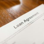 a loan agreement contract printed on paper